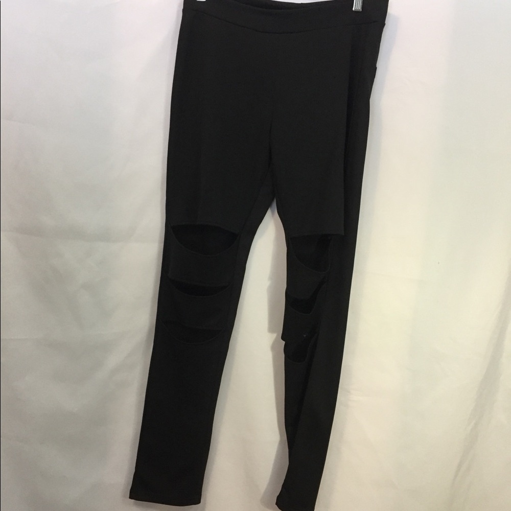 Fredrick’s large black knee slit leggings